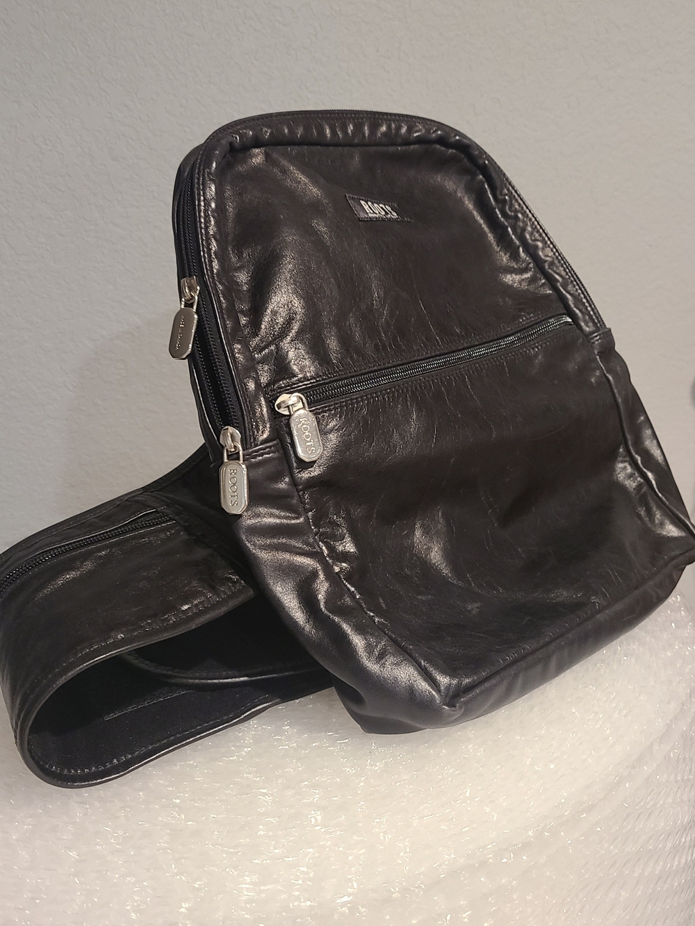 Roots Black Leather One Shoulder Backpack Genuine Leather with Silver Zippers